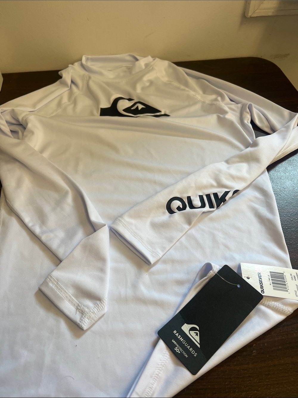Quiksilver White Long Sleeve Rashguard with Black Logo